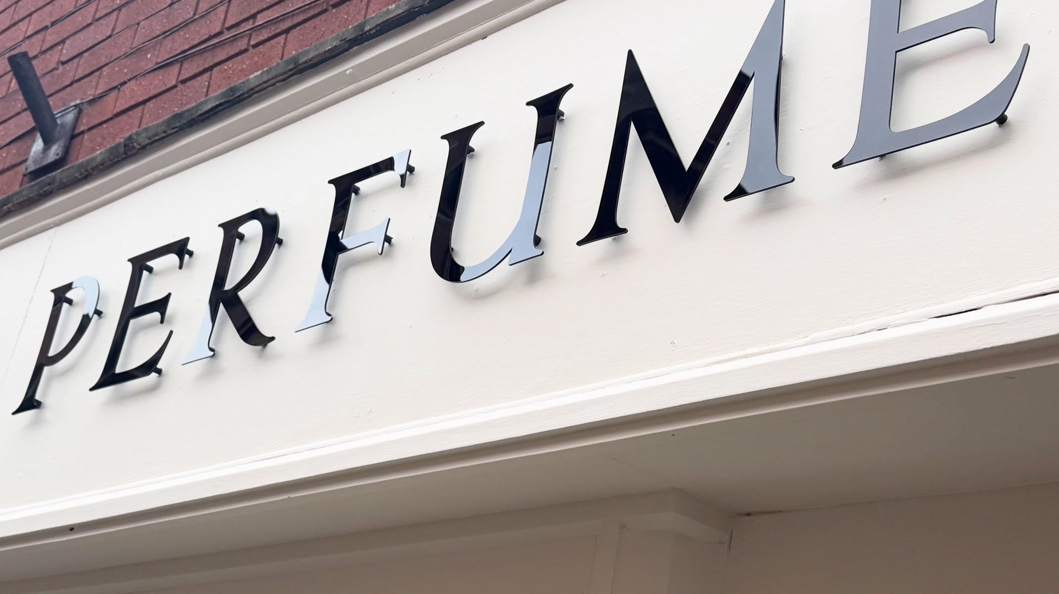 Perfume Laboratory: Monochrome Shop Signage Designed to Define the Brand