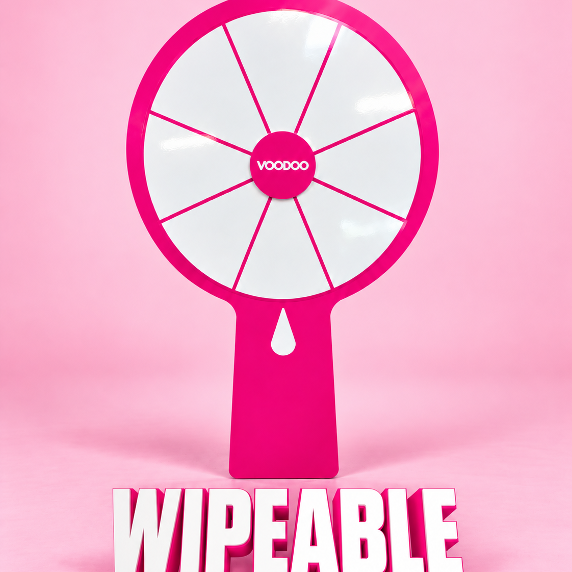 A pink and white spinning wheel toy with the word "WIPEABLE" written below it.