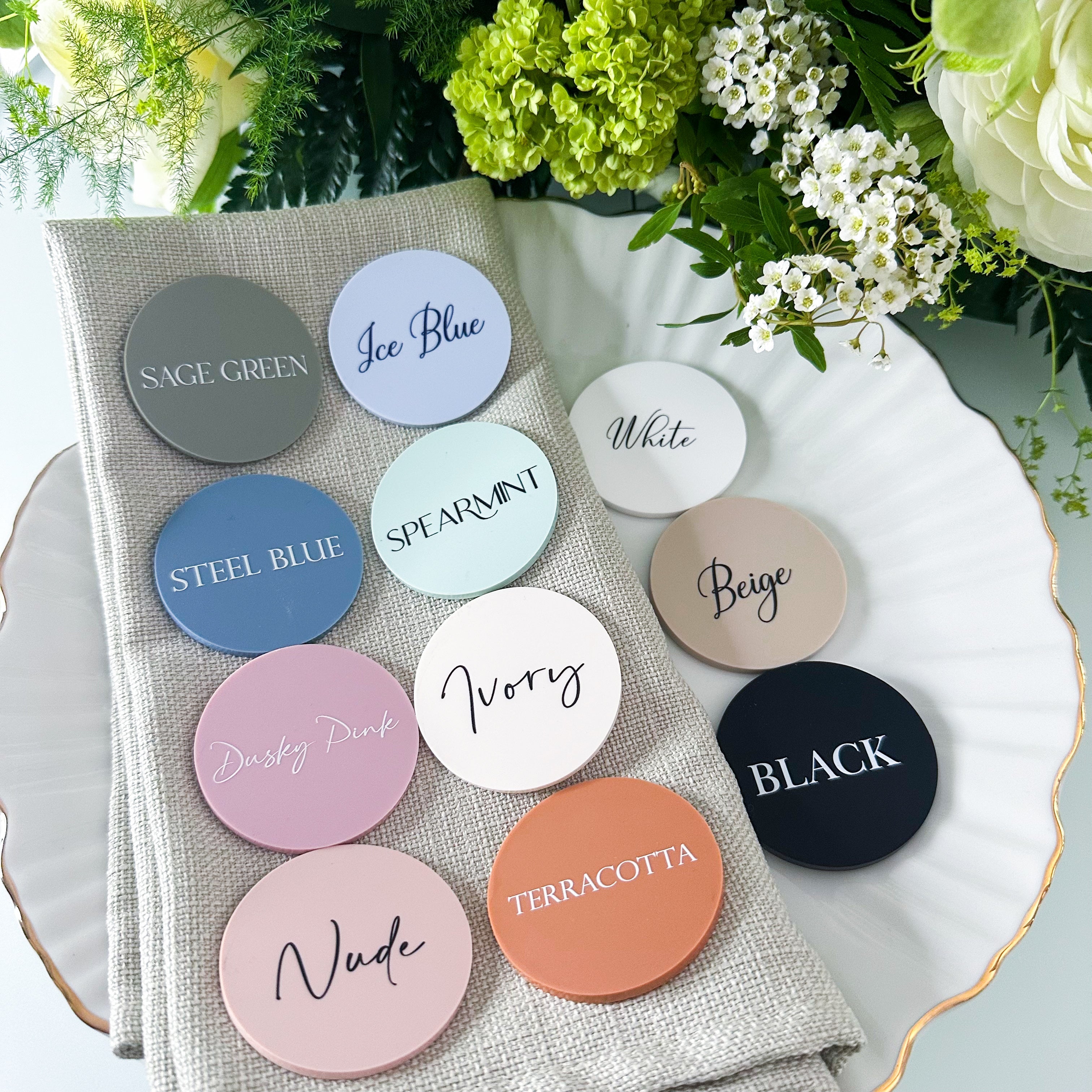 three color mirrors, of material options, each with a different color and the word "Lux" written on it.