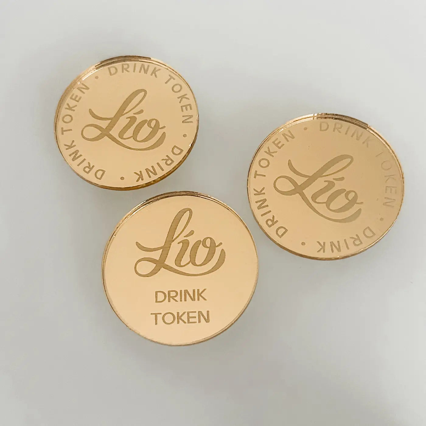 Engraved drinks tokens – custom logo mirror acrylic for business events