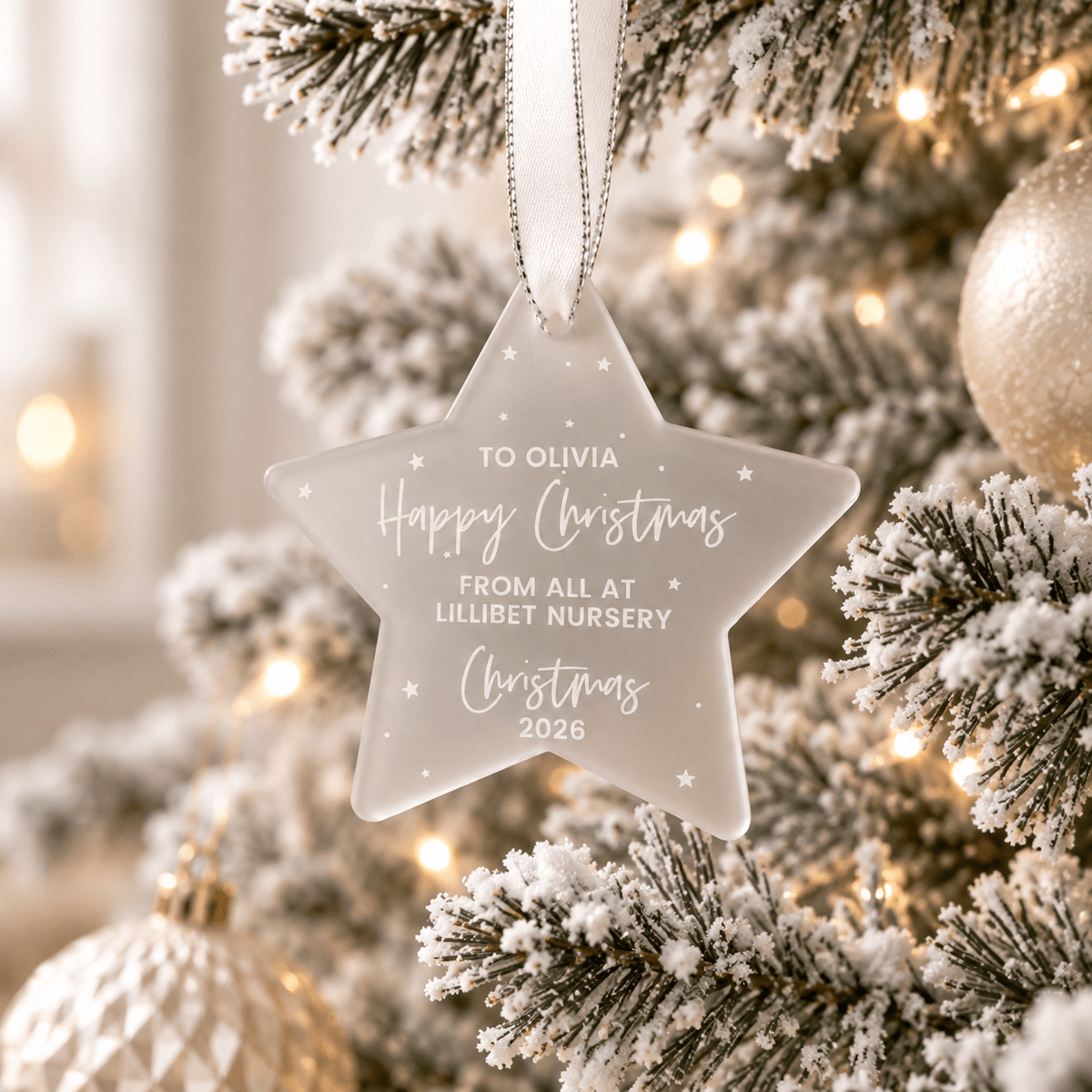Personalised engraved Christmas bauble featuring a custom name design