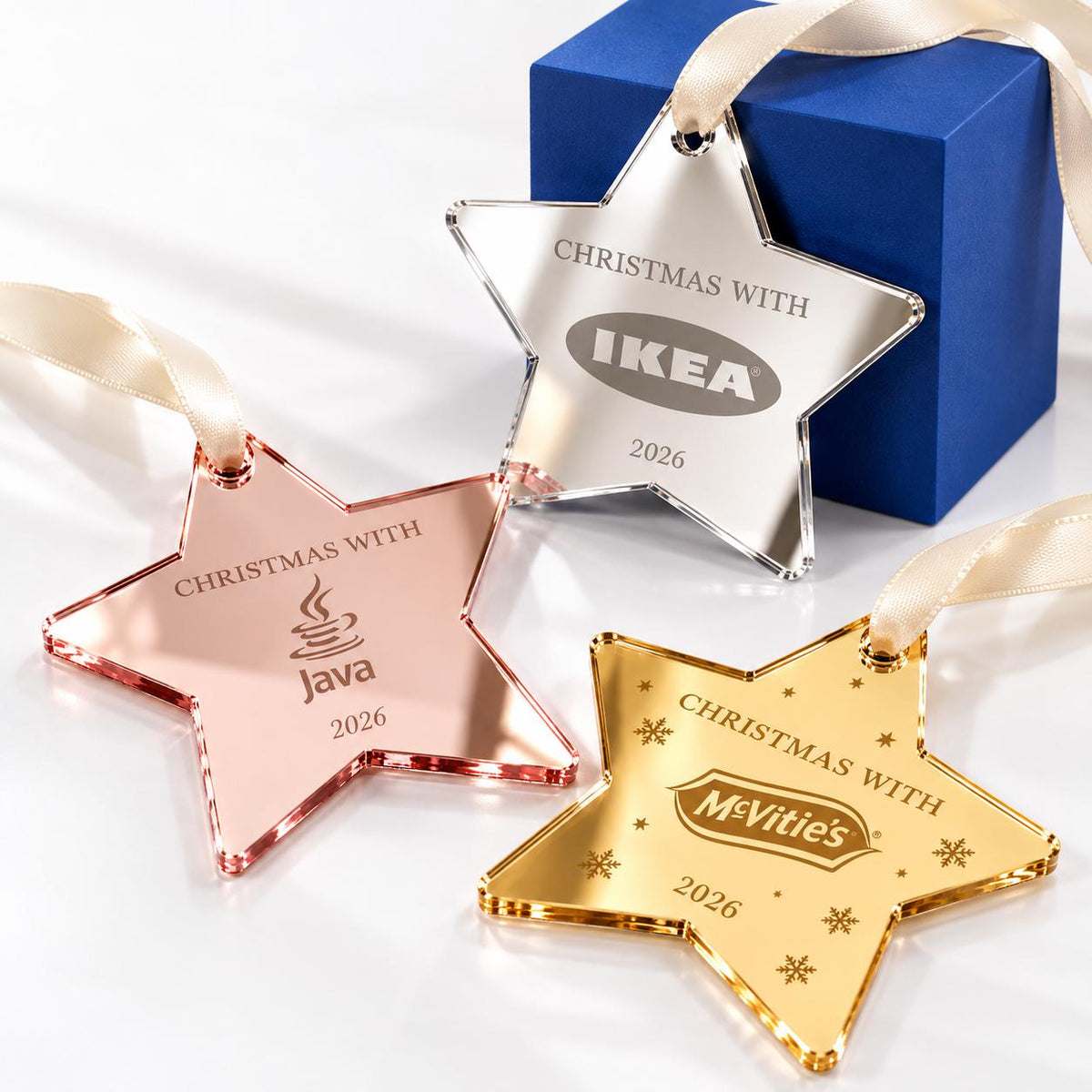 Star-Shaped Logo Christmas Baubles in mirror acrylic for company Christmas displays