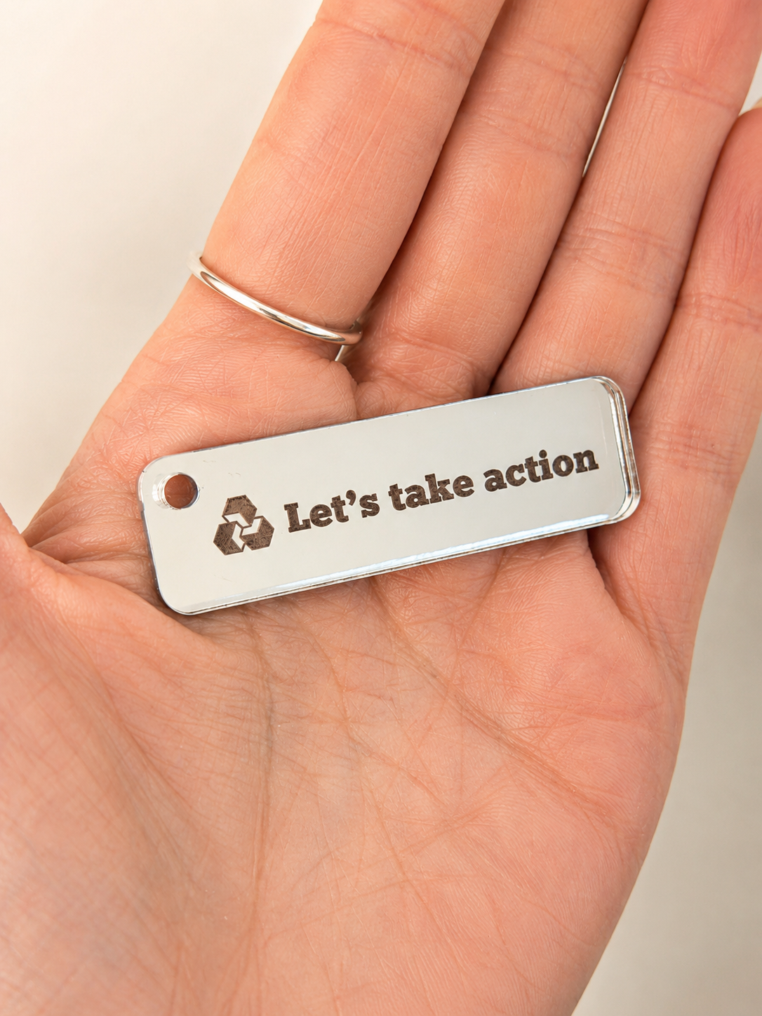 Case Study: NatWest "Let's Take Action" Campaign – Bespoke Mirror Acrylic Keyrings