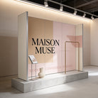 a modern and minimalist display for the brand "MAISON MUSE", with a large text display and a small display stand.