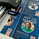 a collage of printed materials, including flyers and brochures, with the text "Meet the Maker" prominently displayed. The materials showcase images of women, and there are QR codes present. The text includes phrases like "The image depicts", "The image displays", "The image shows", "In the image", "The image captures", "The image features", and "The image includes", but these phrases are not used verbatim in the image description.
