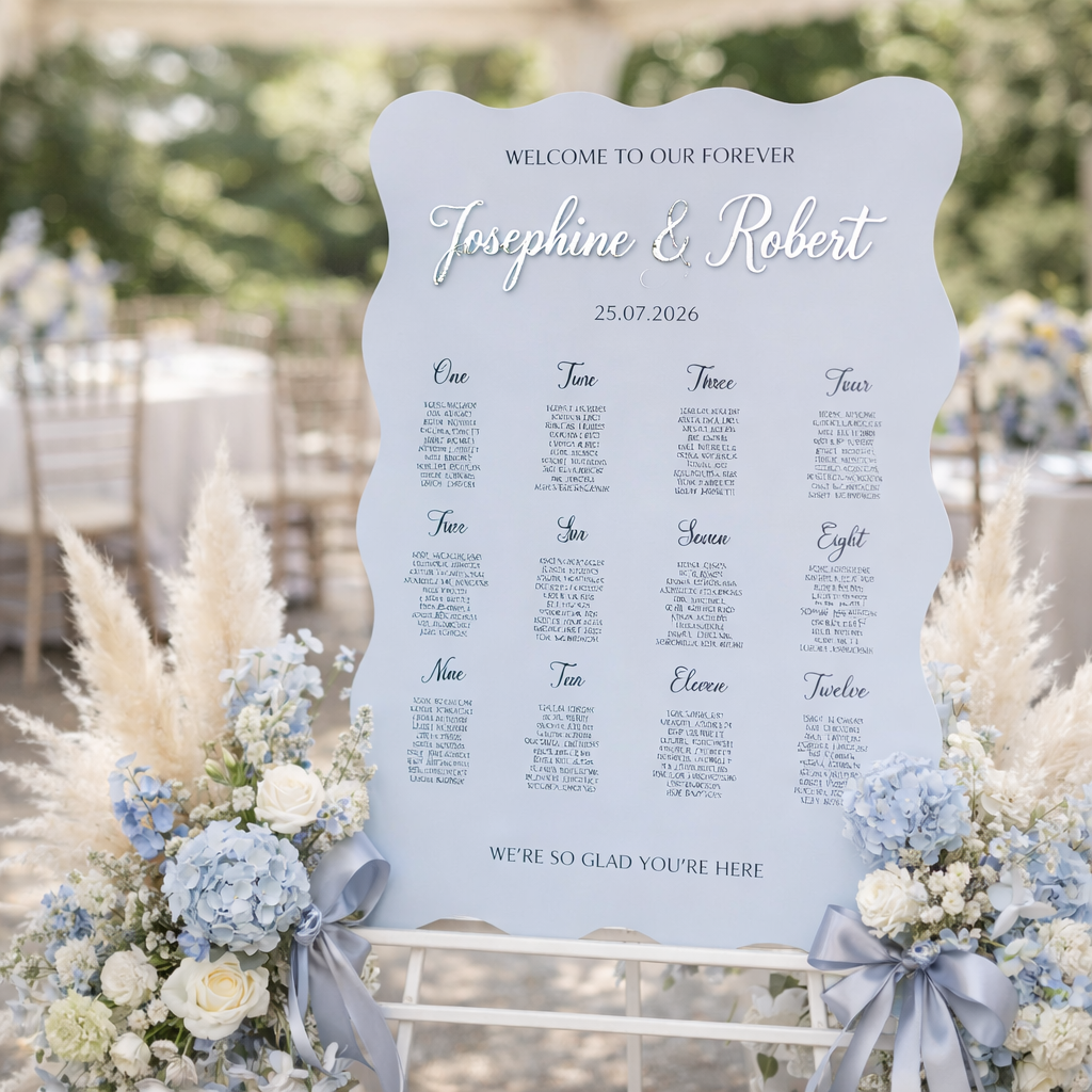 A wedding seating plan sign welcoming guests to the event, with the names Josephine and Robert listed along with their seating assignments.