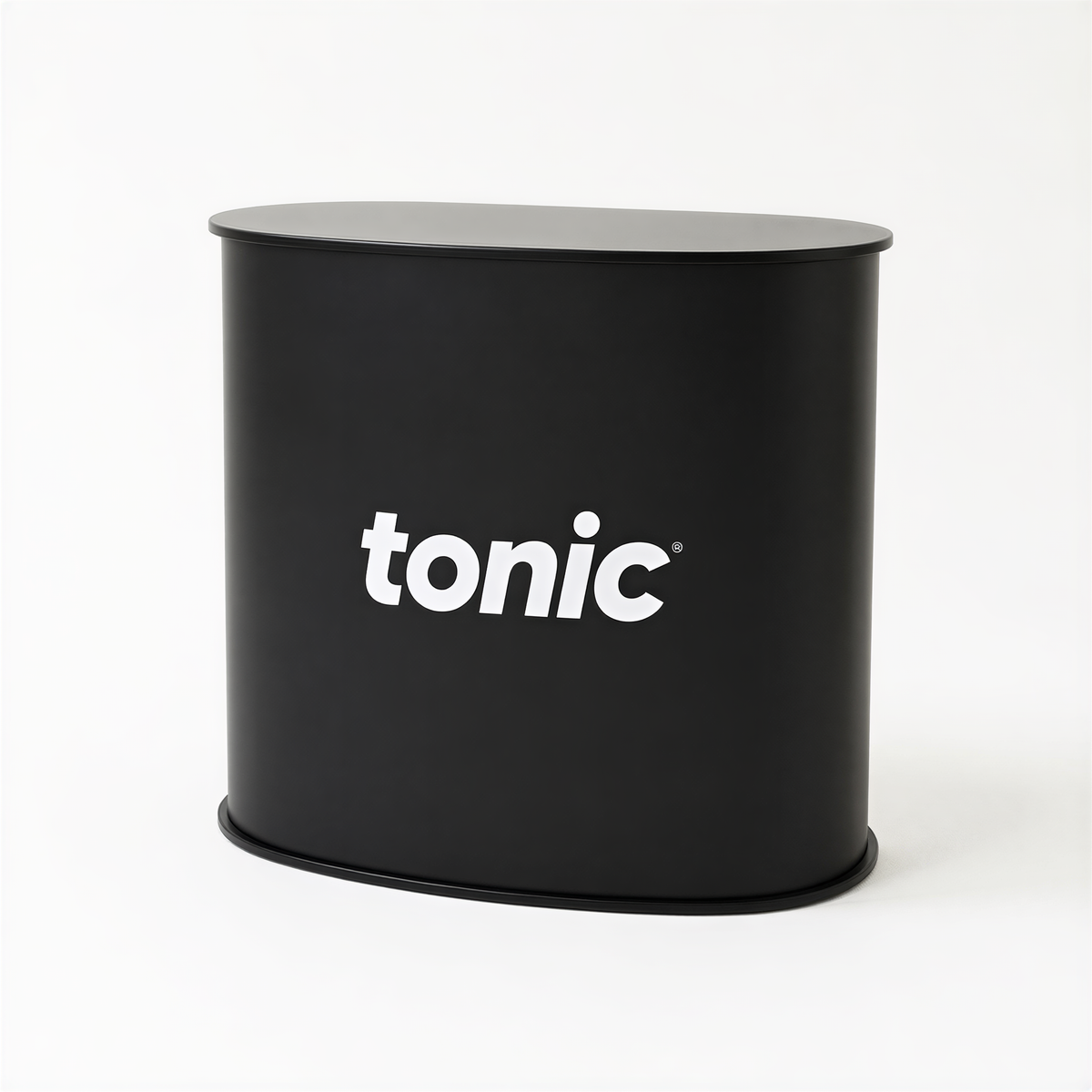 A black cylindrical object with the word "tonic" printed on it in white text.