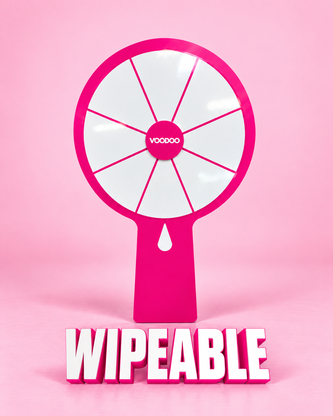 A pink and white spinning wheel toy with the word "WIPEABLE" written below it.