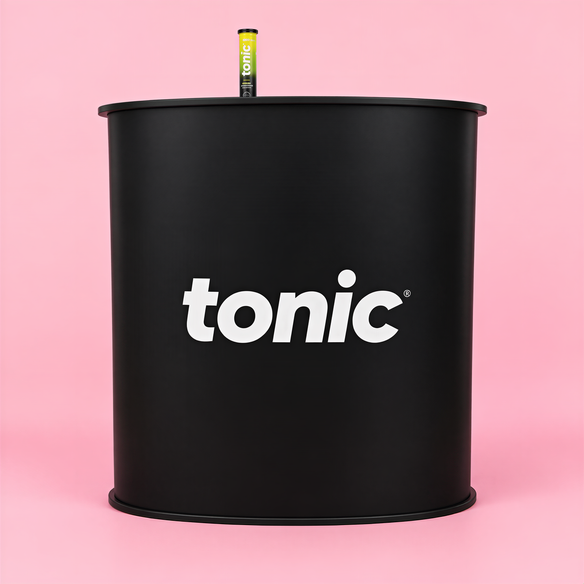 A black cylindrical object with the word "tonic" written on it in white text.