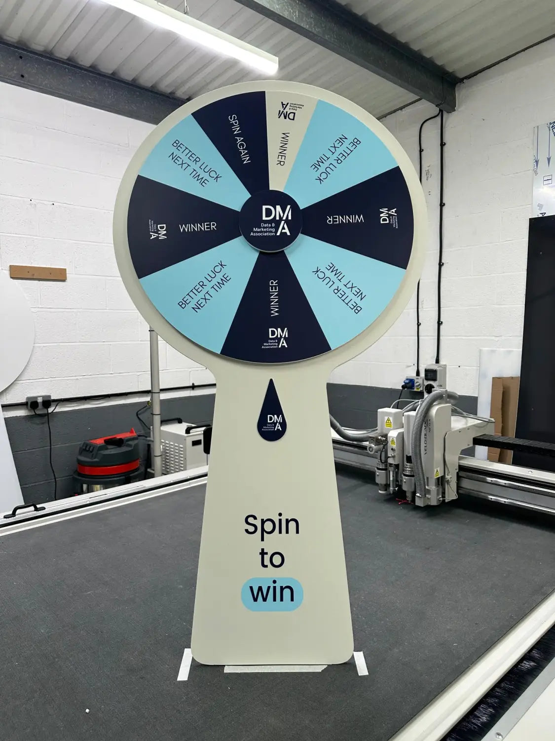 Why every exhibition stand needs a spin to win wheel in 2026