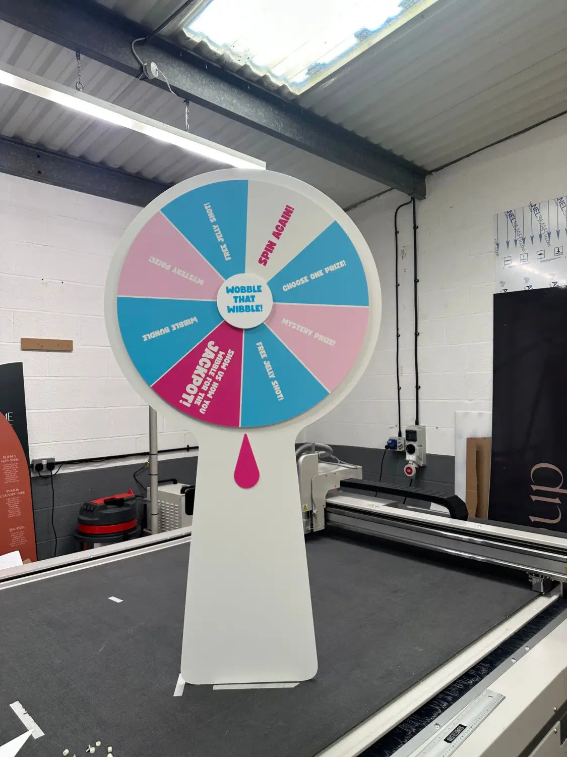 Why every exhibition stand needs a spin to win wheel in 2026