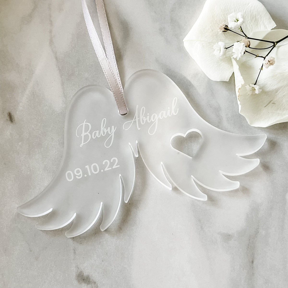 Baby Angel Wings Ornament featuring a custom name design for family remembrance keepsakes