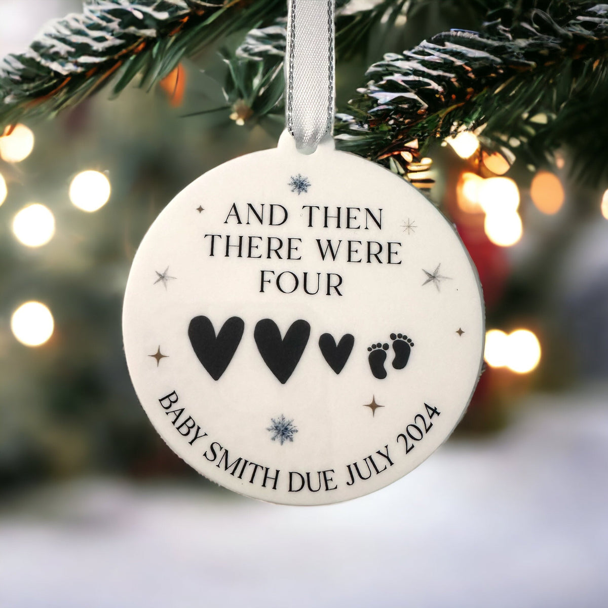 Personalised baby's first Christmas bauble with a custom name design