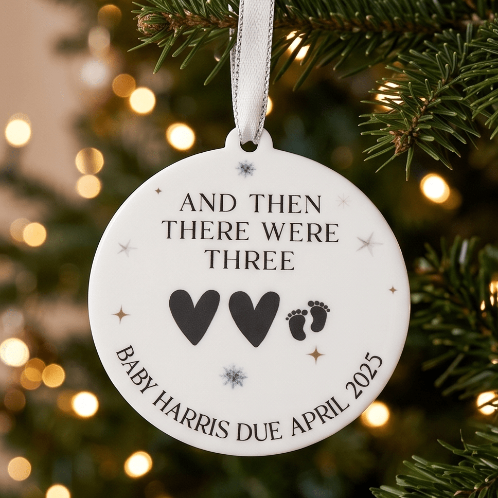 Personalised baby's first Christmas bauble featuring a custom name design for festive baby keepsakes