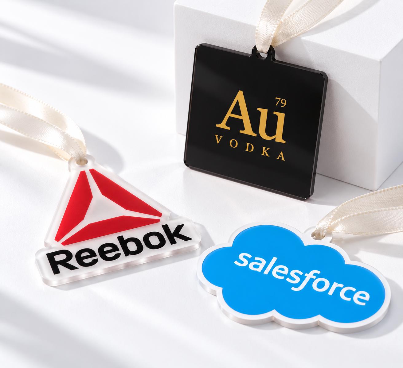 Custom-Shaped Logo Christmas Baubles with custom printed artwork for company Christmas displays