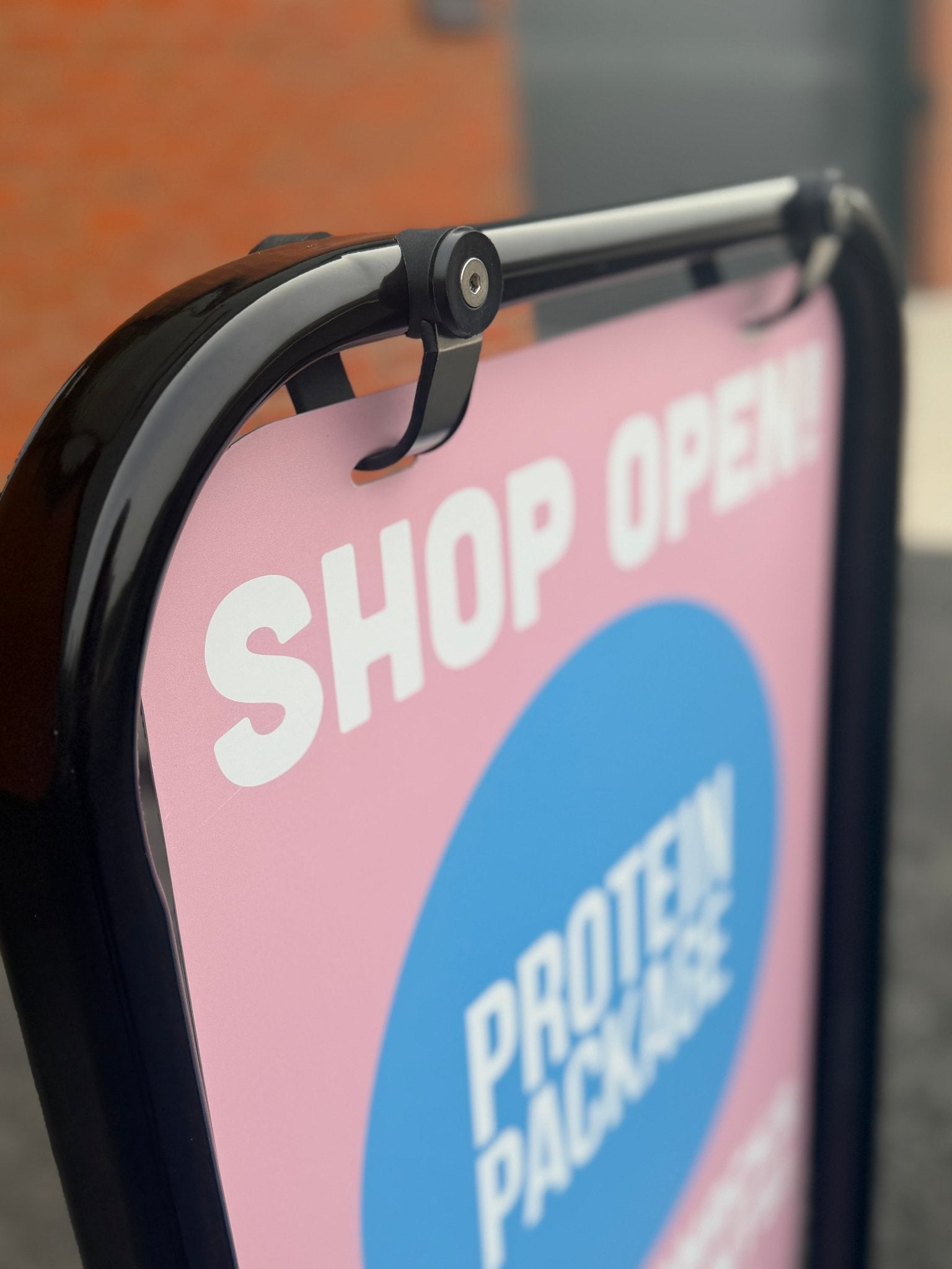 Pavement Swing Sign with custom sign artwork