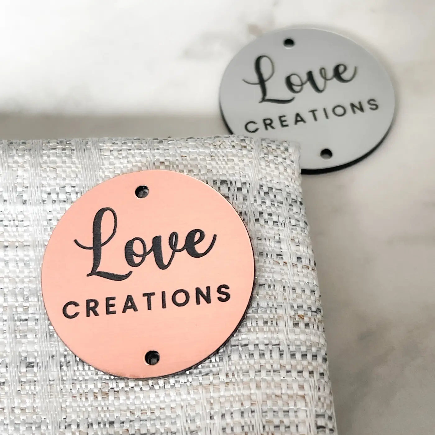 Personalised brand labels – custom acrylic tags | luxury sewing uk