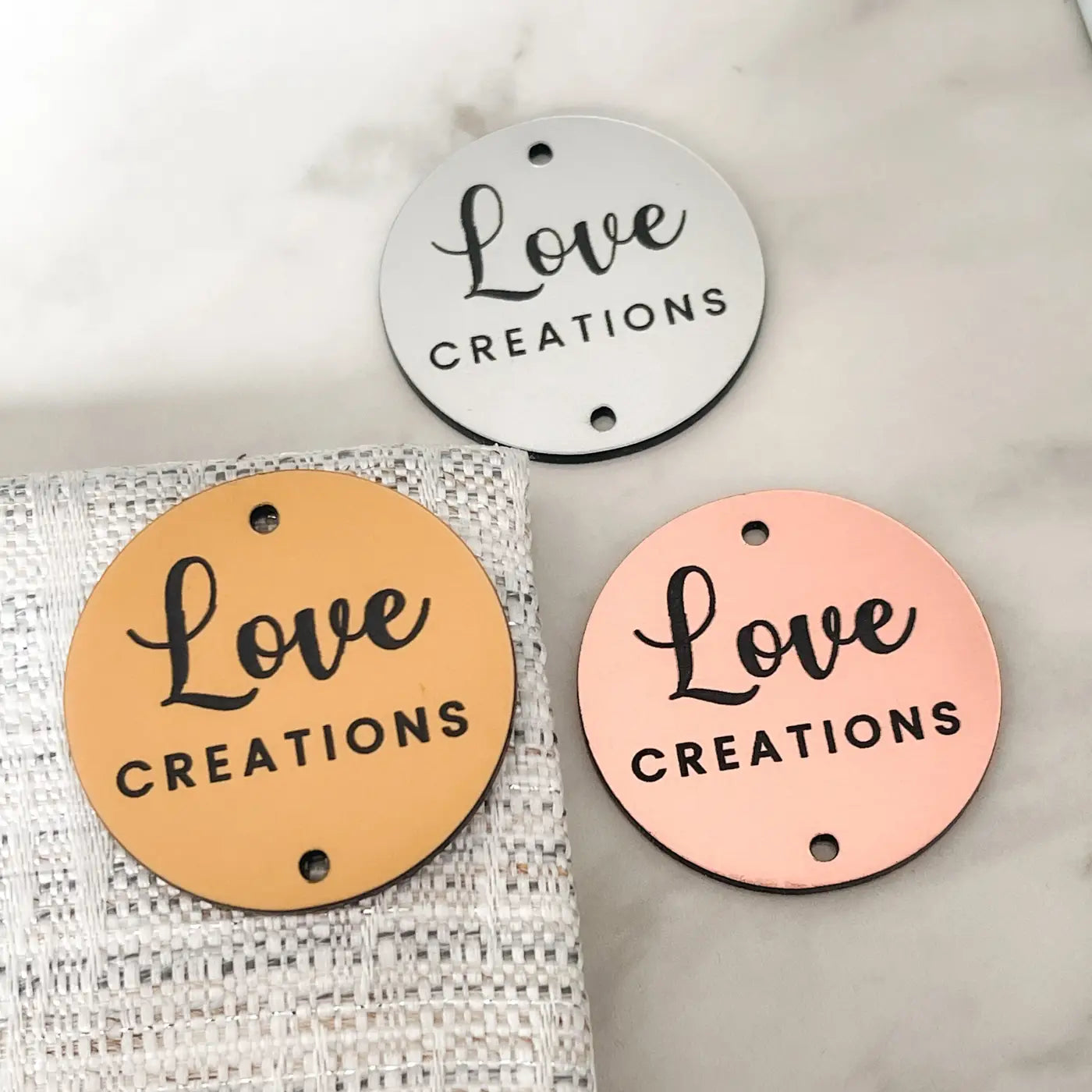 Personalised brand labels – custom acrylic tags | luxury sewing uk