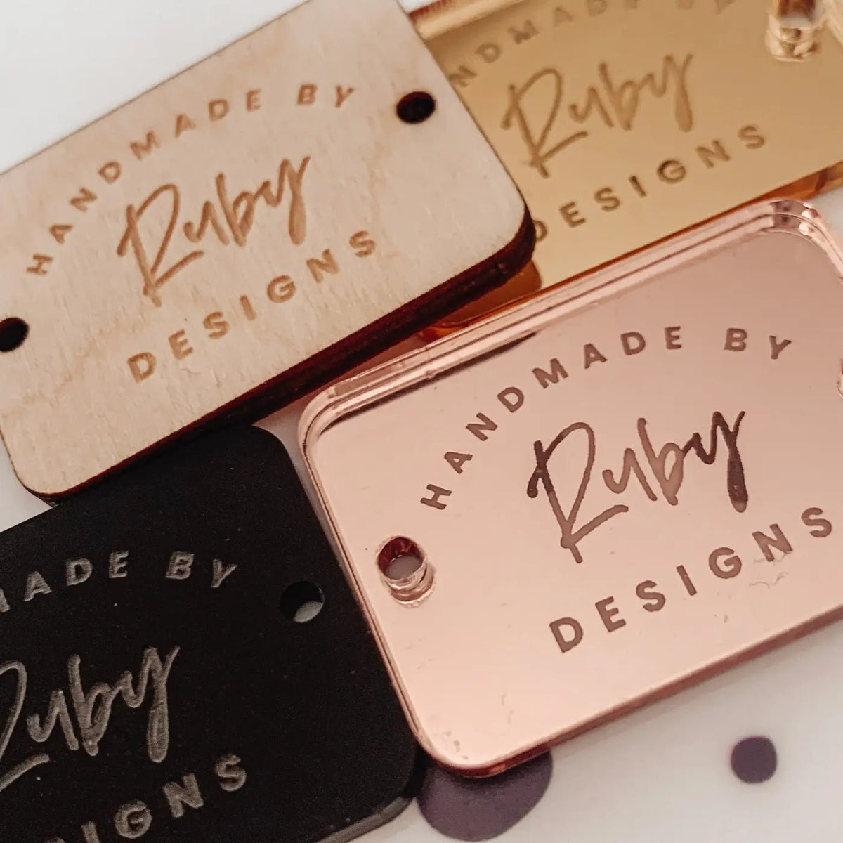 Personalised wood and acrylic button tags with engraving for corporate gift presentation