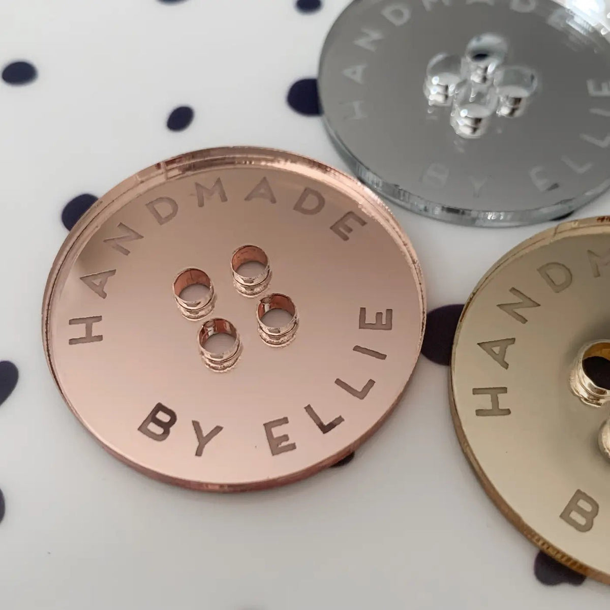 Personalised wood and acrylic button tags with engraving for corporate gift presentation