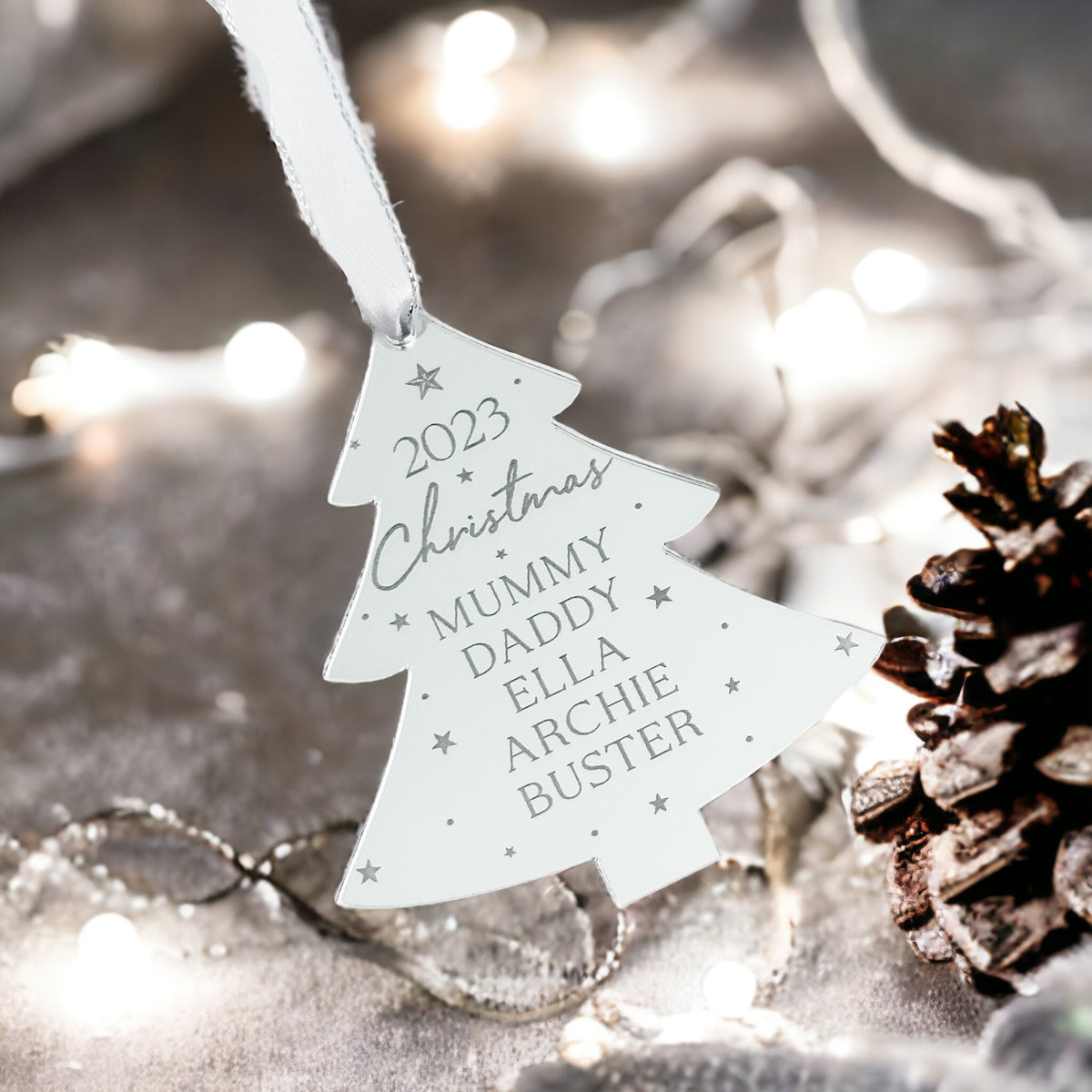 Personalised family Christmas bauble featuring a custom name design for Christmas keepsake gifts