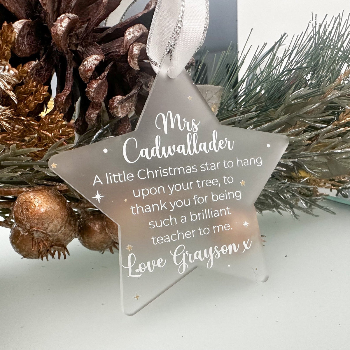 Personalised Christmas Bauble featuring a custom name design for Christmas keepsake gifts