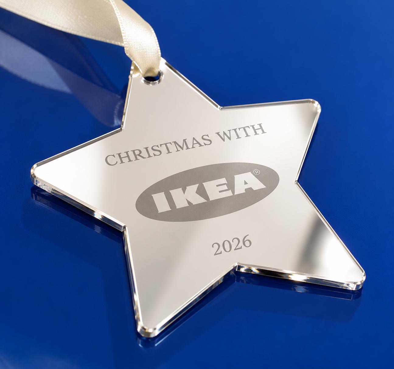 Star-Shaped Logo Christmas Baubles in mirror acrylic with personalised engraving for company Christmas displays